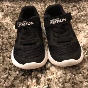 Black and white SKECHERS gym shoes